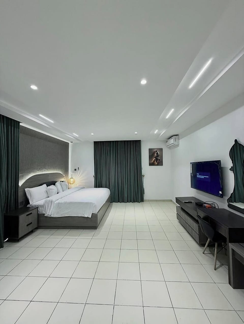 Economy Room, Balcony, City View | In-room safe, desk, laptop workspace, blackout drapes
