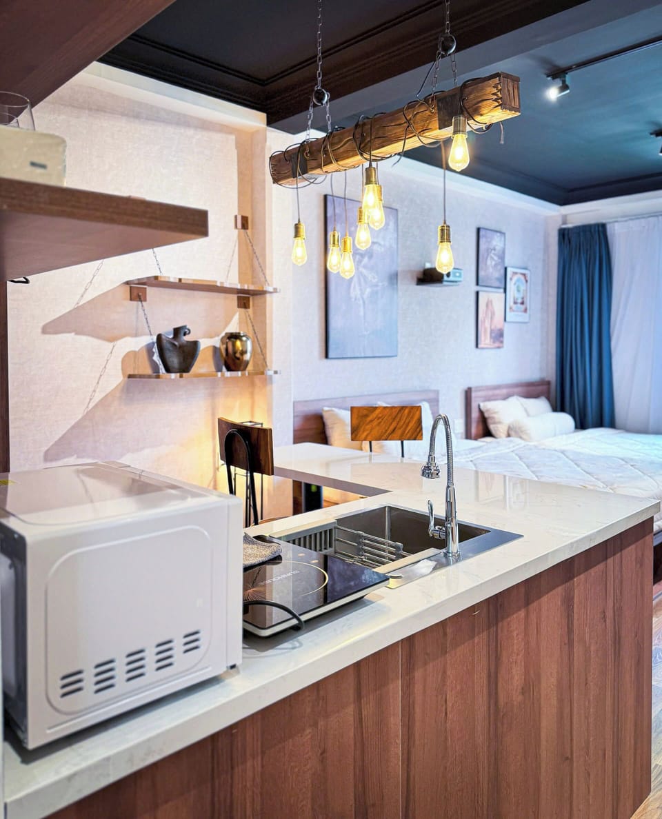 Family Studio Suite, Non Smoking, City View | Private kitchen | Mini-fridge, microwave, stovetop, cookware/dishes/utensils