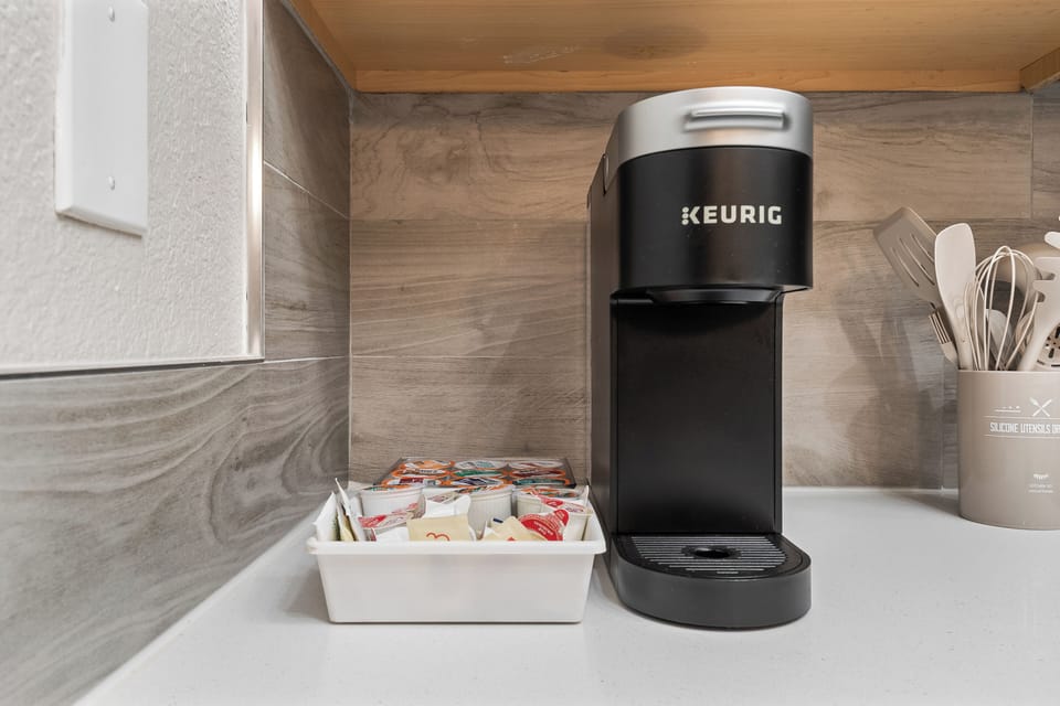 K-cups and coffee basics are provided for each guest