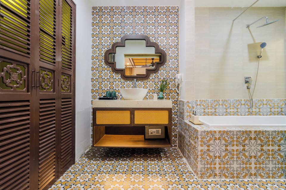 Separate tub and shower, rainfall showerhead, designer toiletries