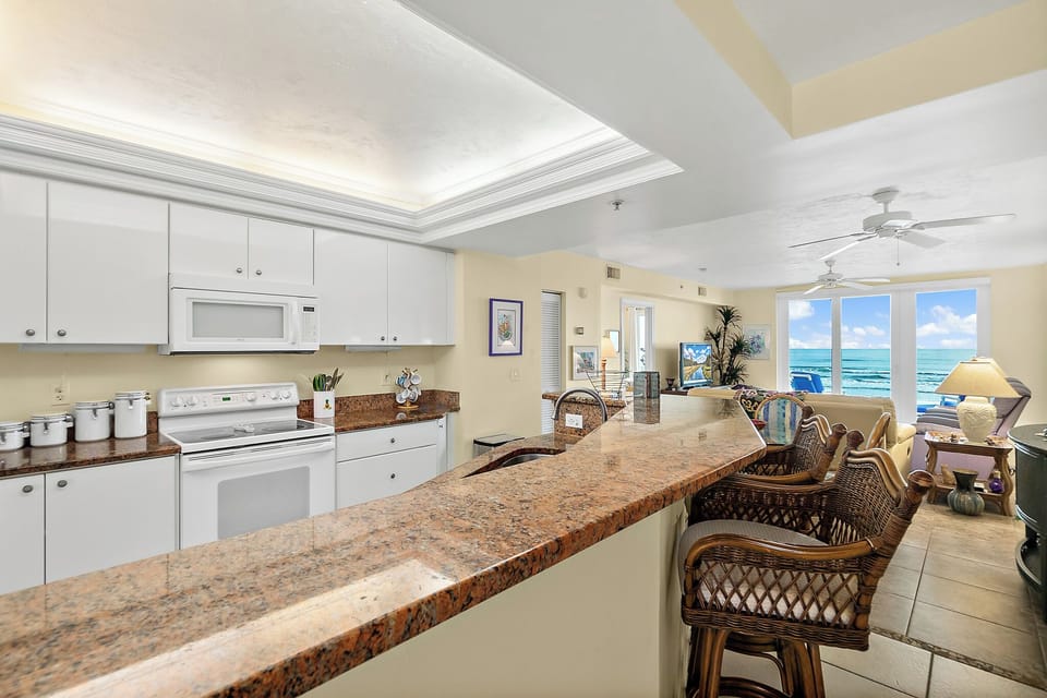 Kitchen island with bar chairs