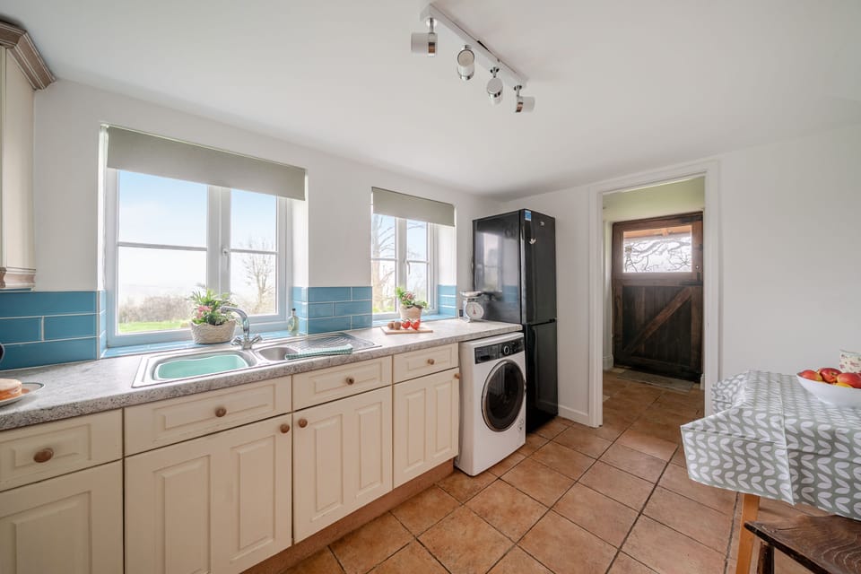 Blackmoor View Cottage, Knighton, Sherborne: A small porch sits beyond the kitchen