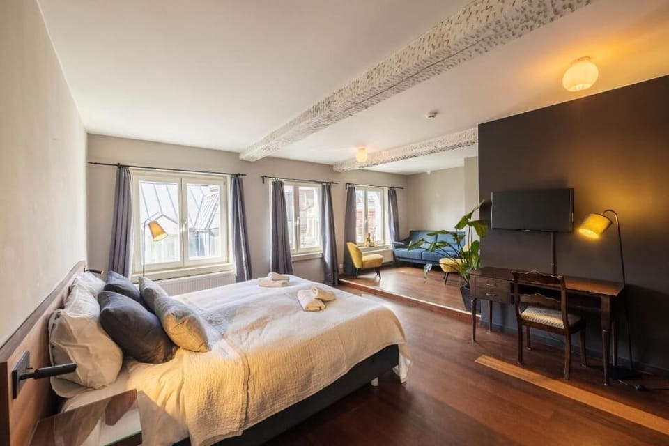Deluxe Double Room, City View | Desk, laptop workspace, blackout drapes, iron/ironing board