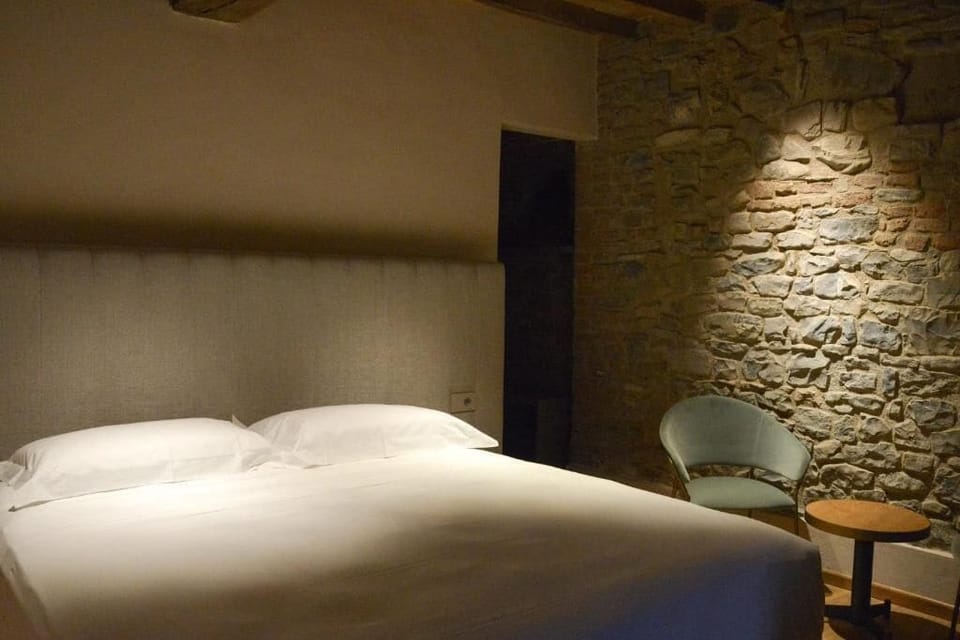 Junior Suite, Courtyard View | In-room safe, desk, blackout drapes, soundproofing