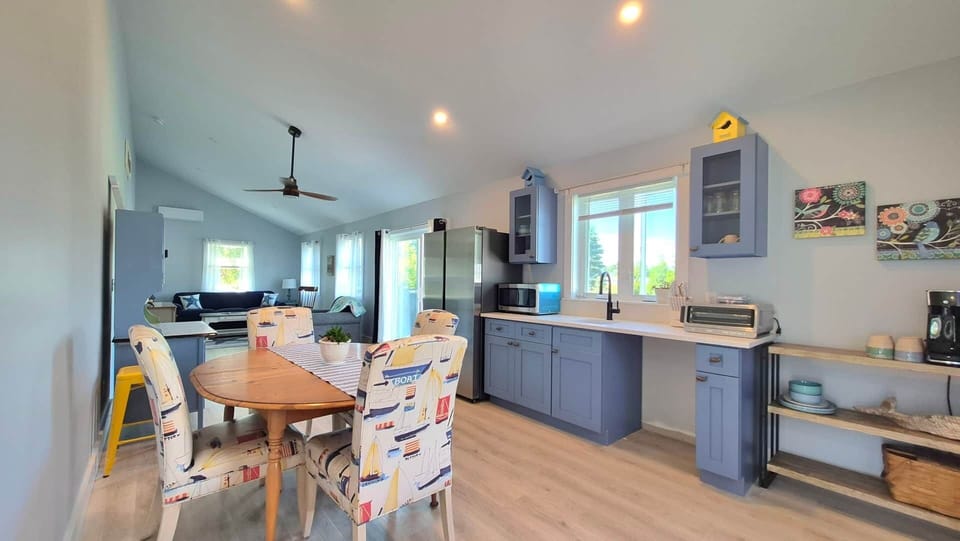 Beachy kitchenette with all the amenities and storage needed!