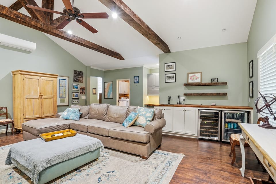 1129 Peachtree - Den Wet Bar - The den's wet bar and wine fridge tucked into the back — the conversation never has to stop.
