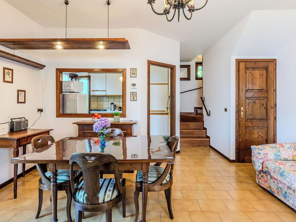 Furniture, Interior Design, Flooring, Wood, Ceiling, Floor, Table, Room, Couch, Lighting