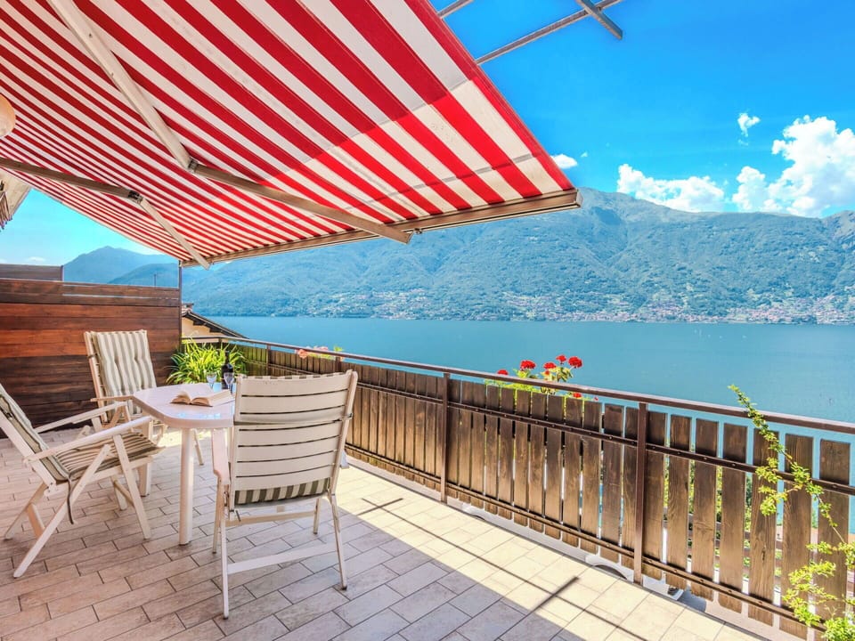 Furniture, Outdoor Furniture, Chair, Resort, Mountain Range, Balcony, Eco Hotel, Houseplant, Coast, Flowerpot