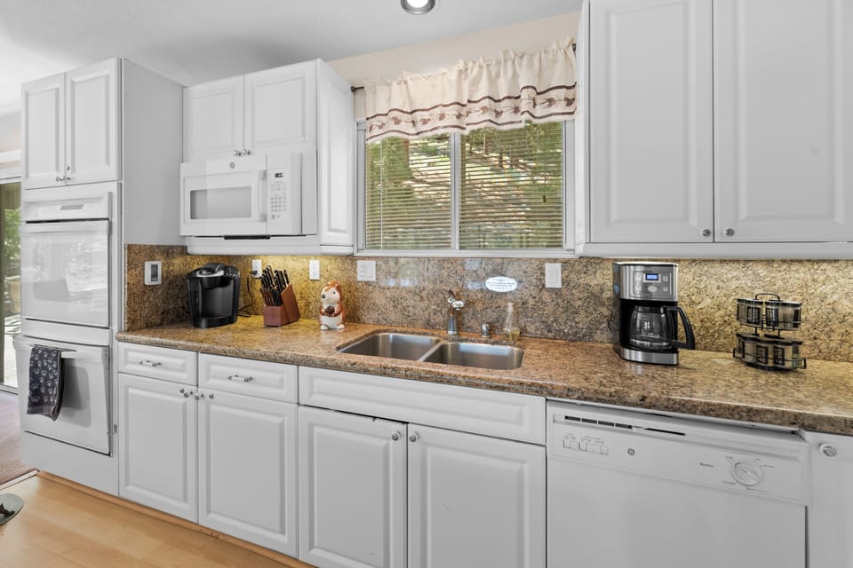 Full Kitchen - Full kitchen with coffee maker, double oven, Keurig, dishwasher, and all of the necessities