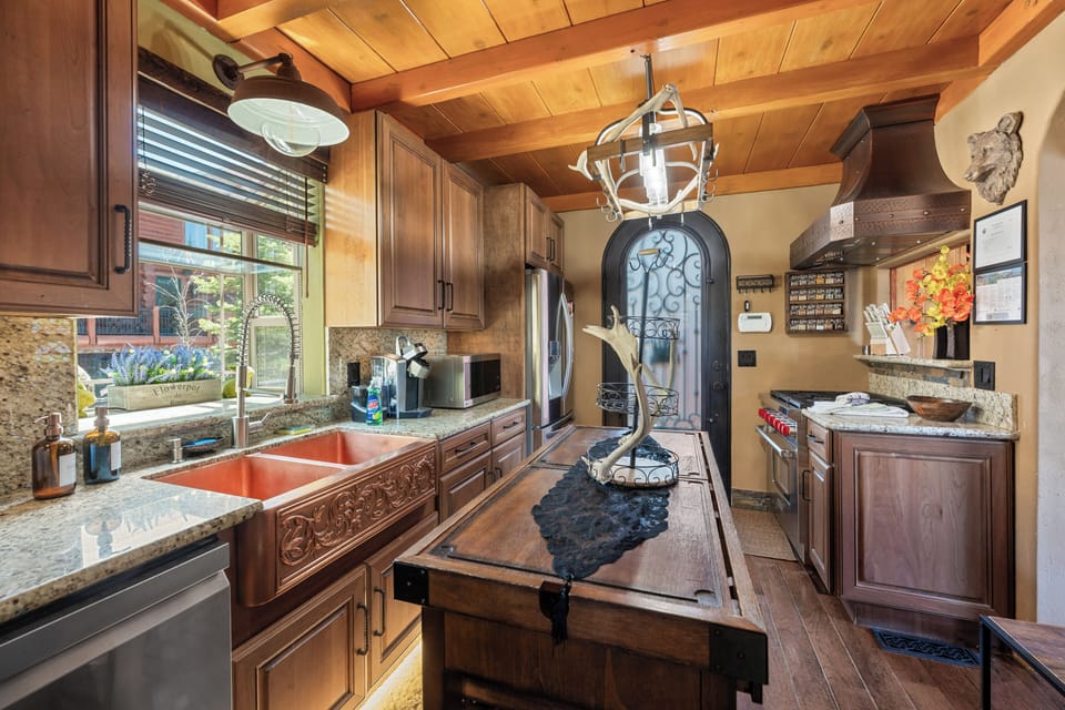 Kitchen - Full Kitchen with outdoor BBQ – Propane, Wolf Range Stove/Oven, Dishwasher, Microwave, Frigidaire Fridge, K-Cup Coffee Maker, and Dishwasher