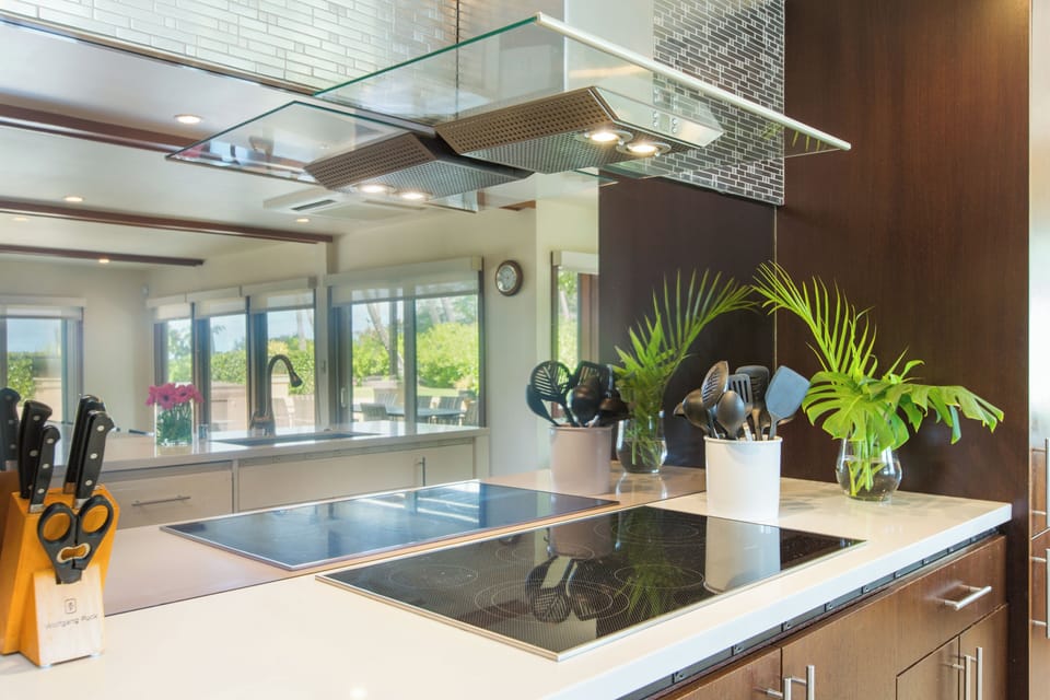 Cook with ease in the modern kitchen featuring premium appliances and clean finishes.