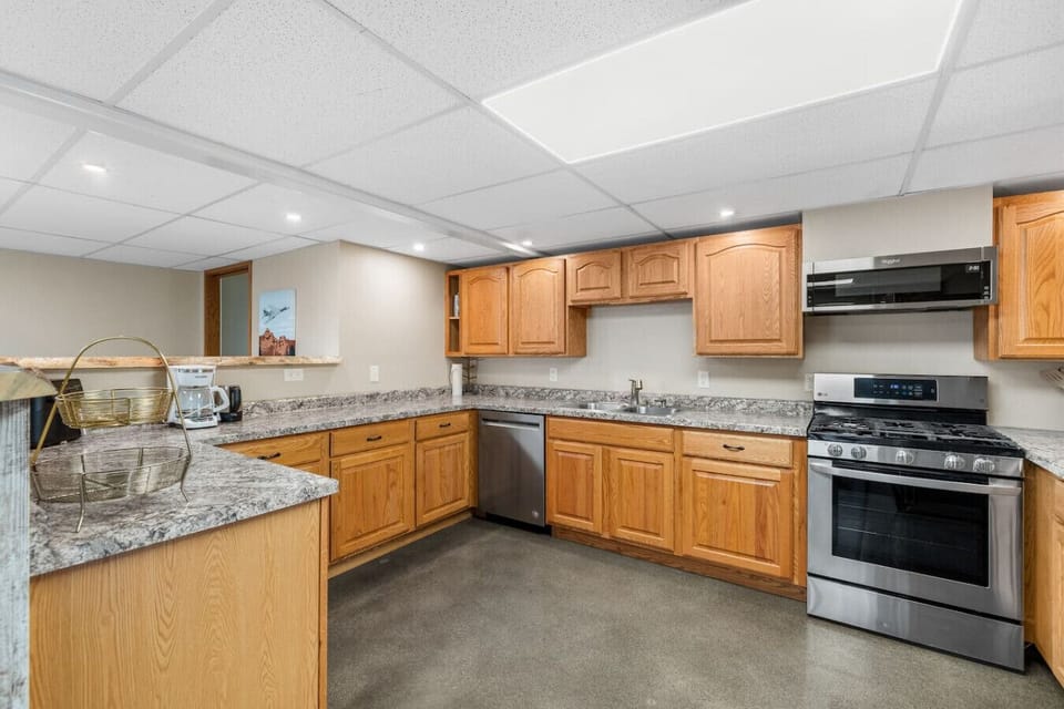 Prepare meals and enjoy home-cooked comfort in this fully equipped kitchen.