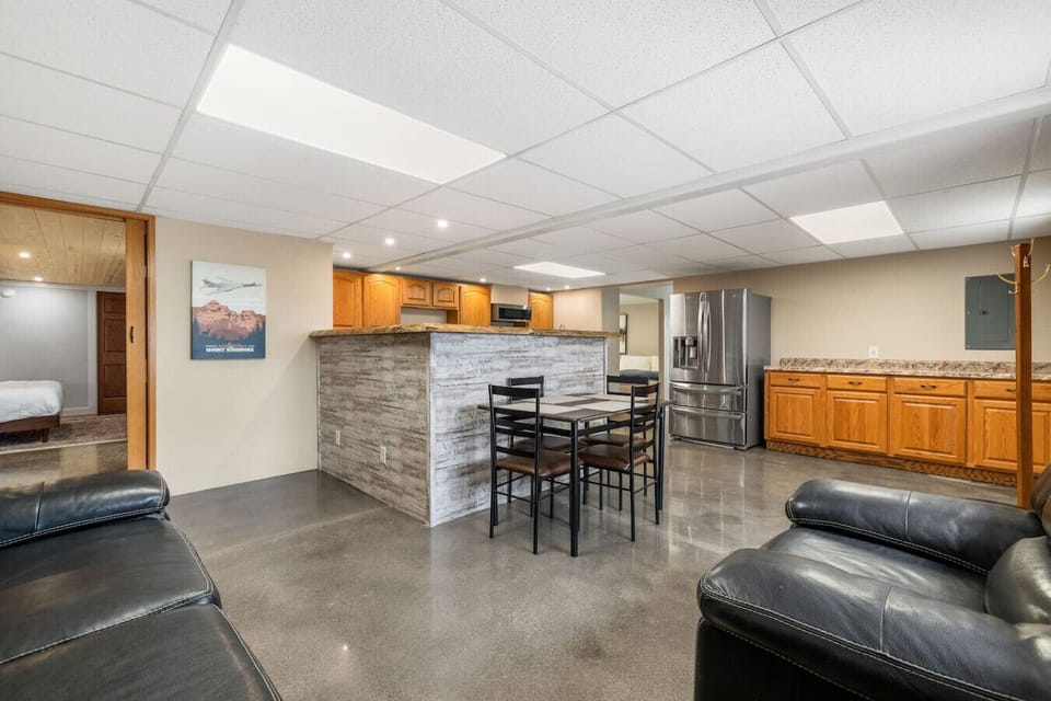 This open-concept layout ensures you can cook, dine, and relax all in one welcoming space, making it ideal for families, groups, or professionals staying for work.