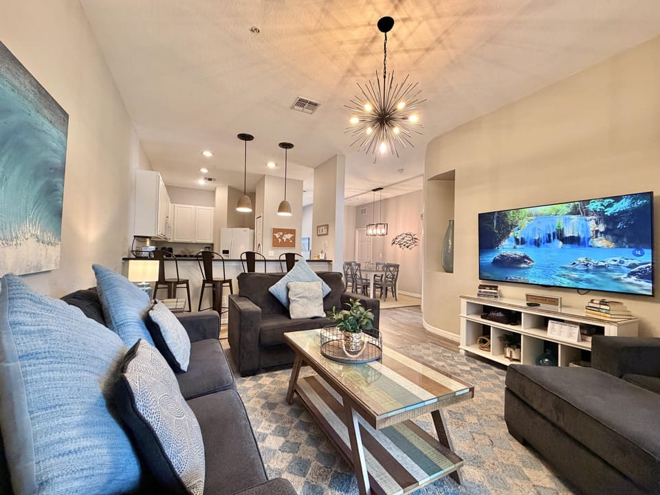Updated living room with large Smart TV.