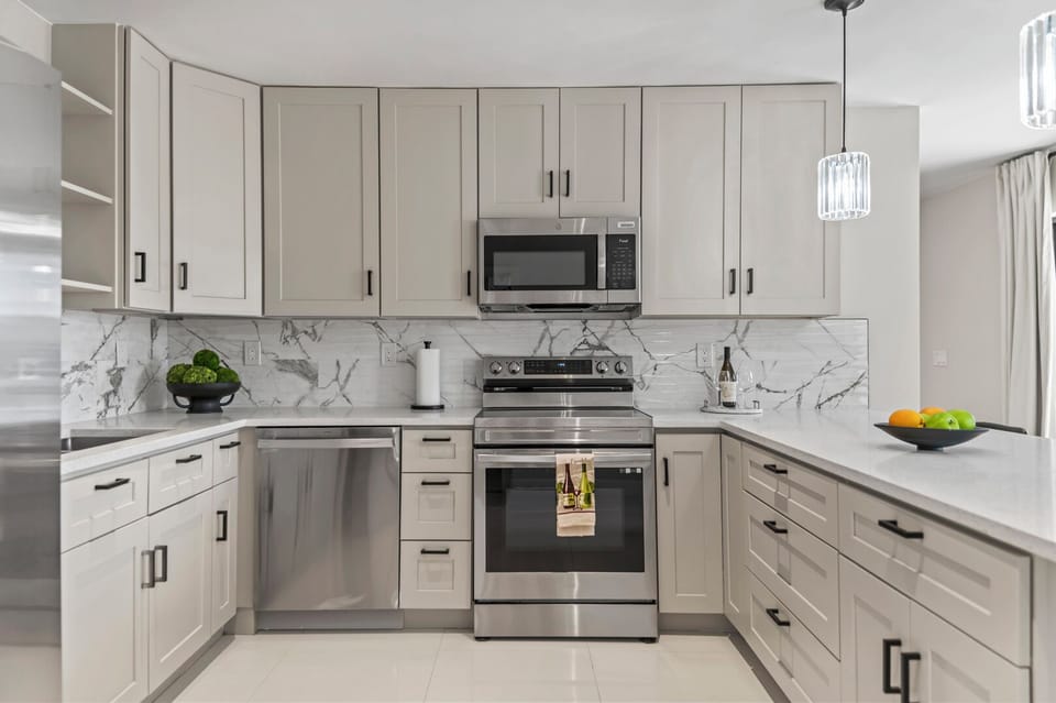 Sleek kitchen with modern appliances and ample counter space
