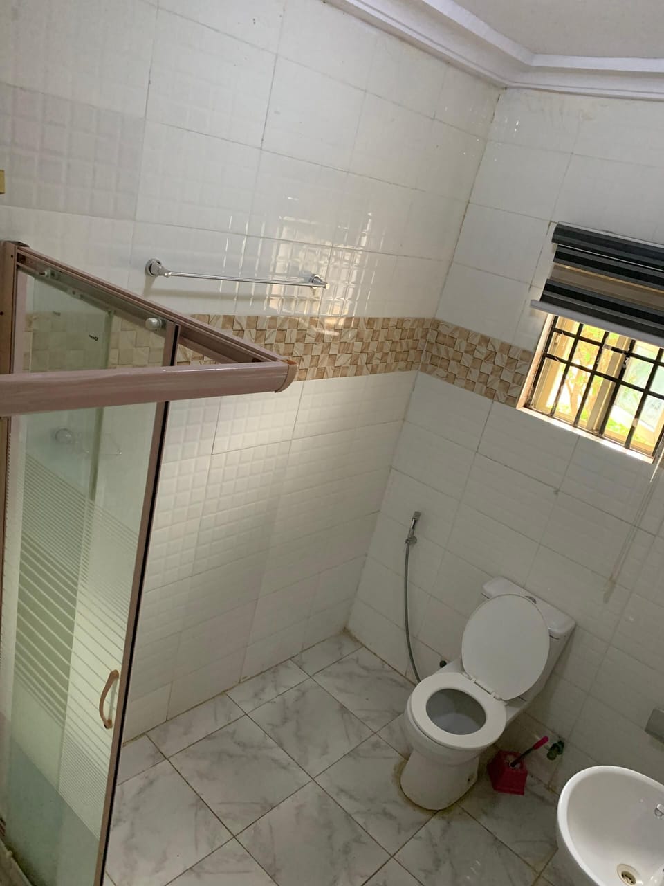 Shower, towels, soap, toilet paper