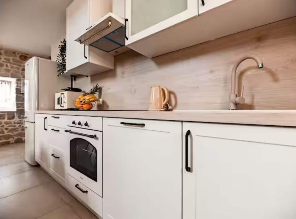 House (Two Bedroom Holiday Home) | Private kitchen | Fridge
