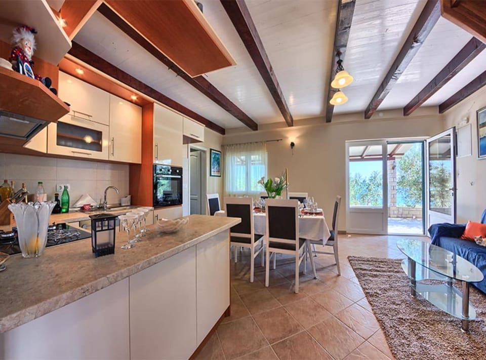 Villa (FourBedroom Beachfront Villa with Poo) | Private kitchen | Fridge