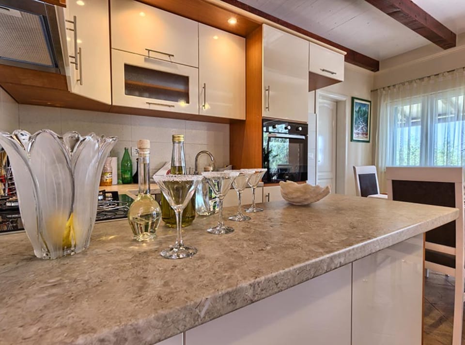 Villa (FourBedroom Beachfront Villa with Poo) | Private kitchen | Fridge