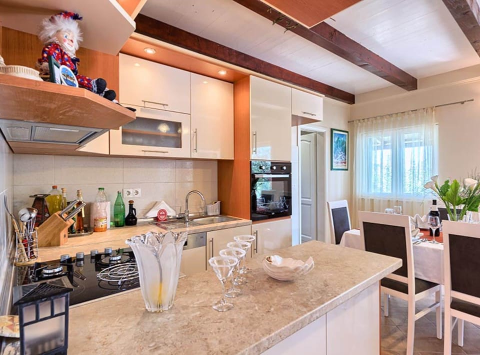 Villa (FourBedroom Beachfront Villa with Poo) | Private kitchen | Fridge