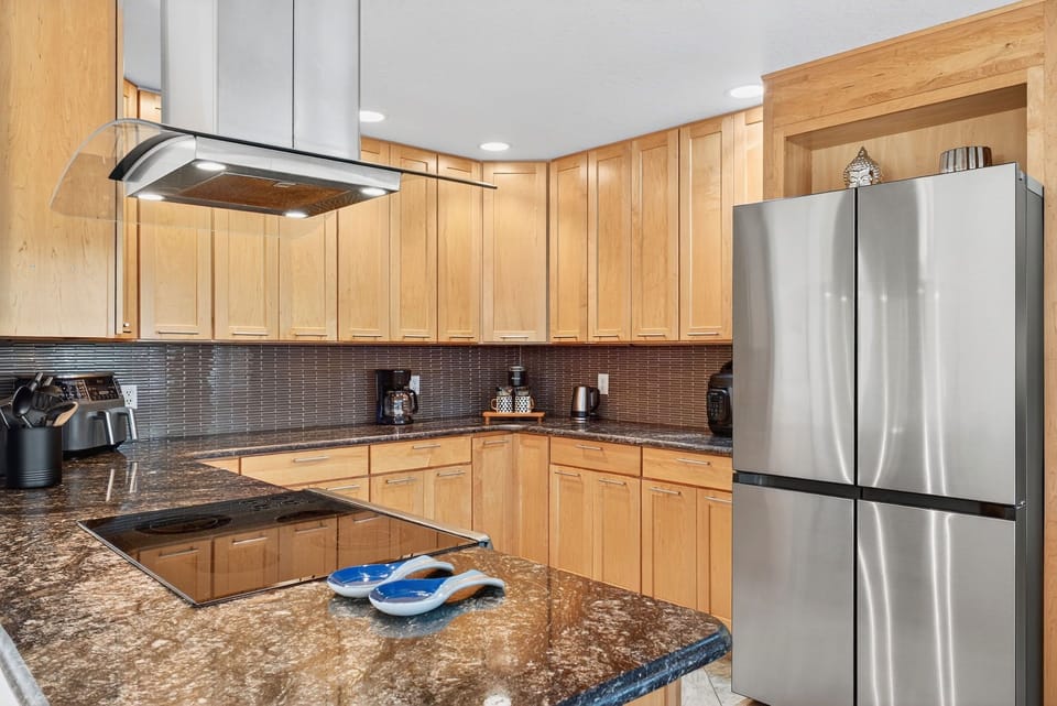 A sleek kitchen equipped with modern appliances. 