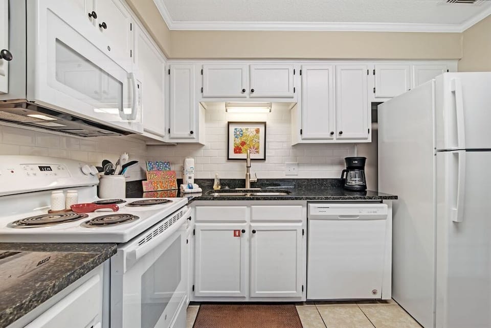 Kitchen - w/new granite and backsplash