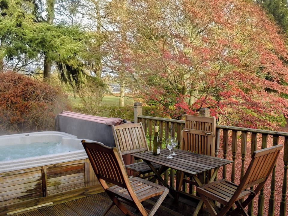 Charming decking area | Rose Cottage - Auchendennan, Arden, Alexandria