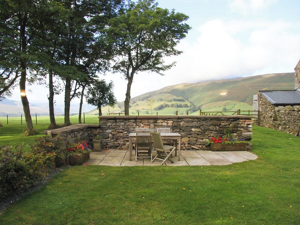 Lawned garden with sitting out area | Bannerdale, Mungrisdale, near Keswick