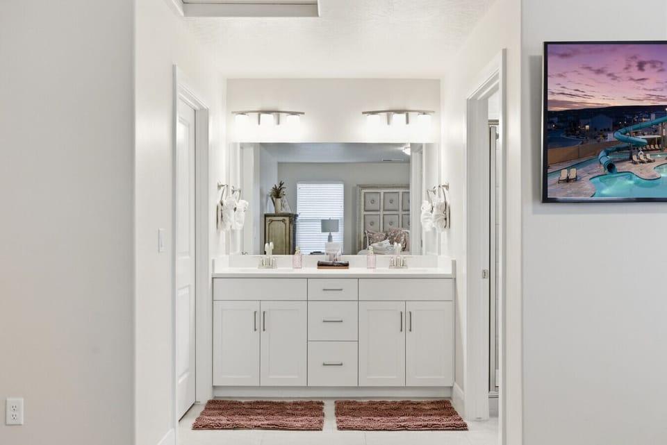 Master Bedroom Ensuite: Dual sinks and stylish decor for your rejuvenating getaway!