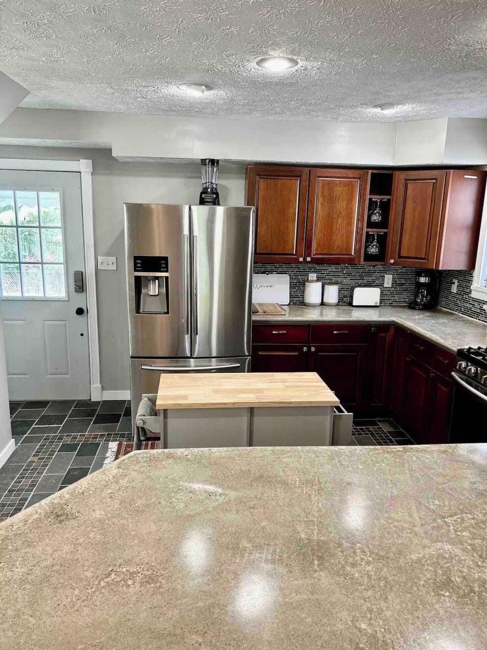 View from bar seating of the kitchen. 