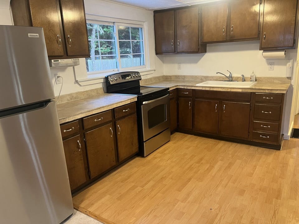 Recently renovated kitchen with new stainless steel appliances. 