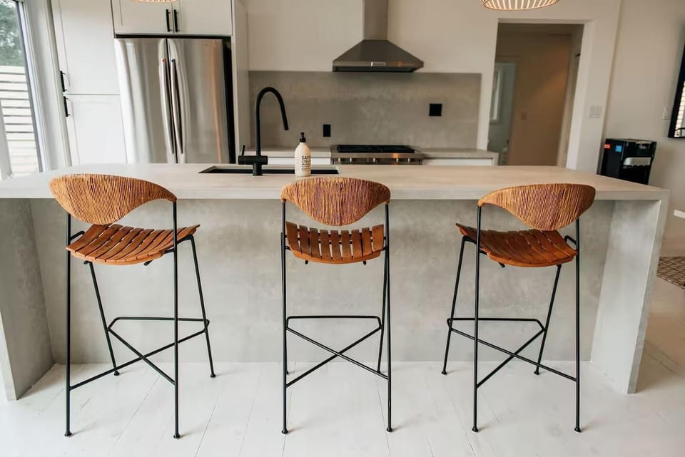 Sleek modern kitchen with spacious island and cozy bar seating