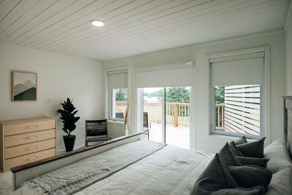 Bright and airy bedroom with private patio access