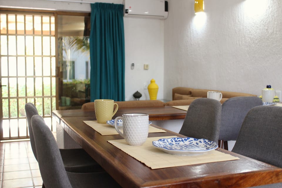 Family House, Balcony, Garden View | Private kitchen | Coffee/tea maker, toaster, dining table