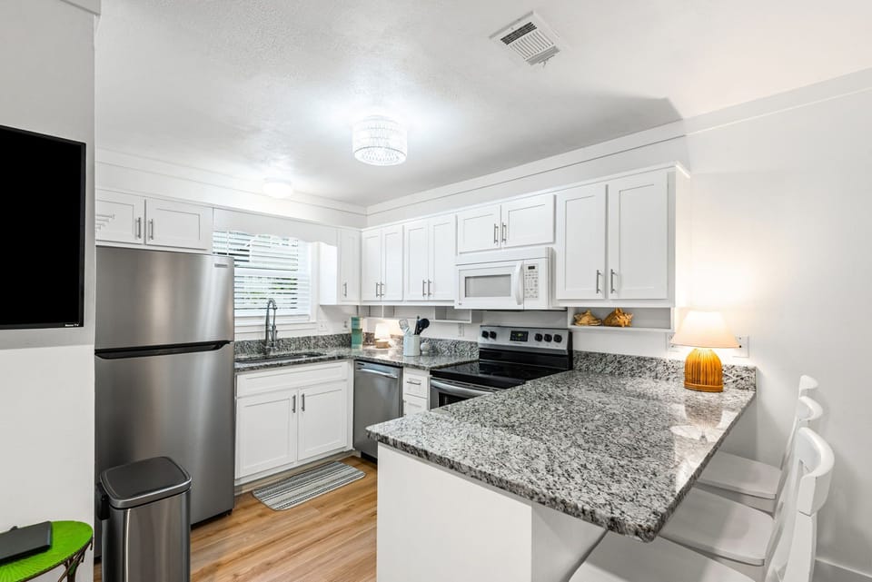 Condo, Multiple Beds, Patio, Garden View (Beachside Villas 713 - Pet Friendly) | Private kitchen