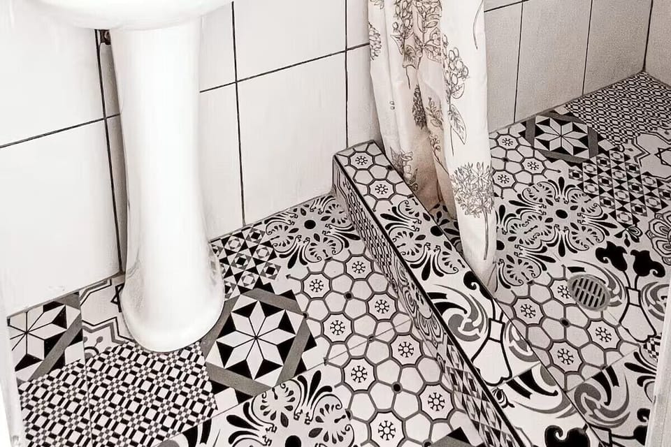 Family Quadruple Room | Bathroom | Towels, soap, toilet paper