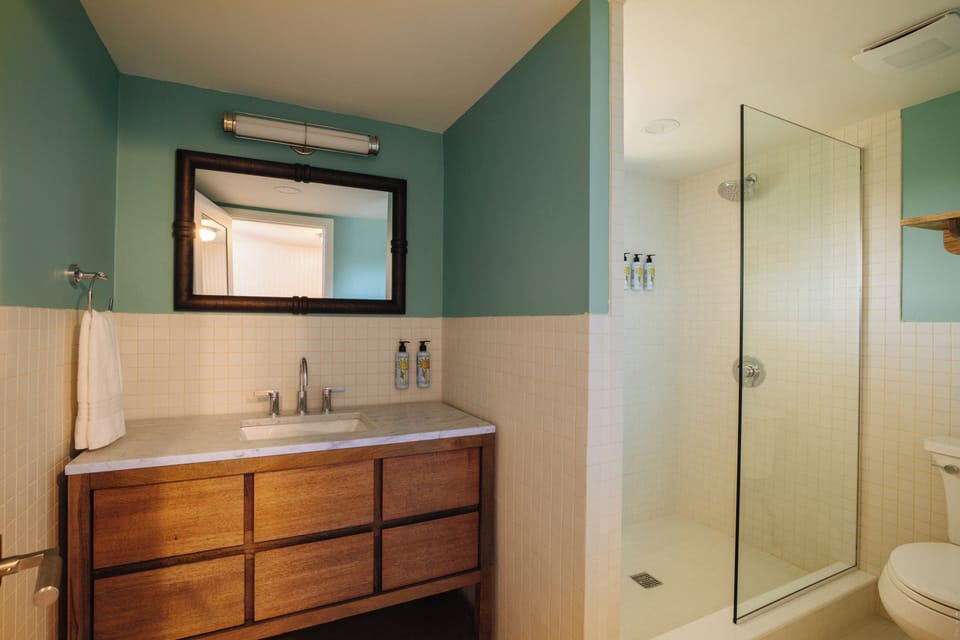 Room, Bay View | Bathroom | Hair dryer, towels, soap, shampoo