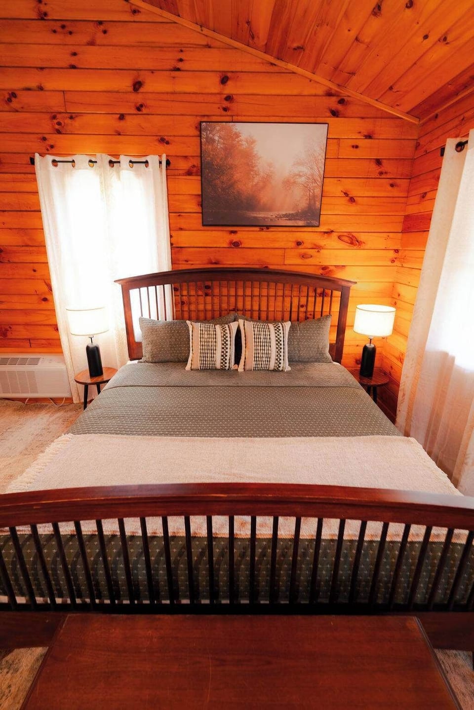 Rustic Retreat: Experience tranquility in this beautifully furnished bedroom with scenic views!