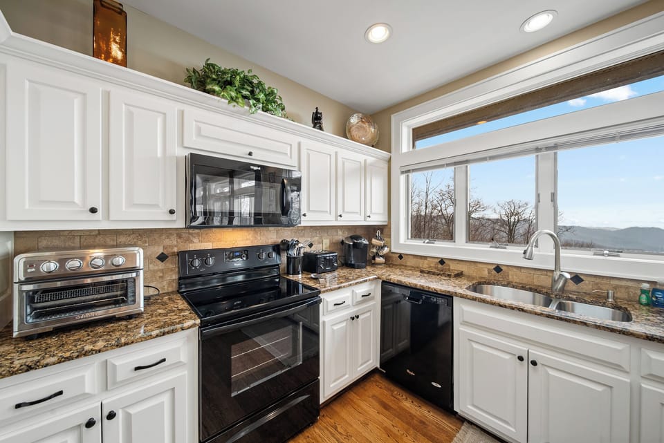 Granite Counters in the Well Equipped Kitchen