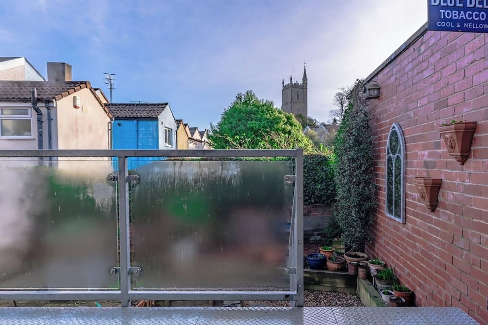 Terrace with garden and city views
