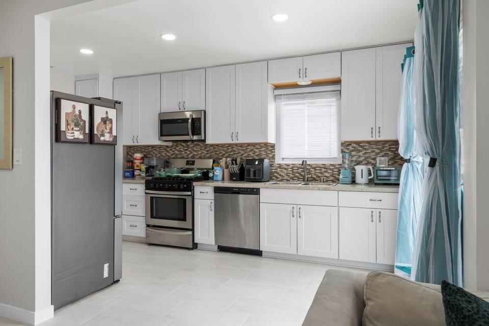 Additional kitchenette angle showing full functionality and space.