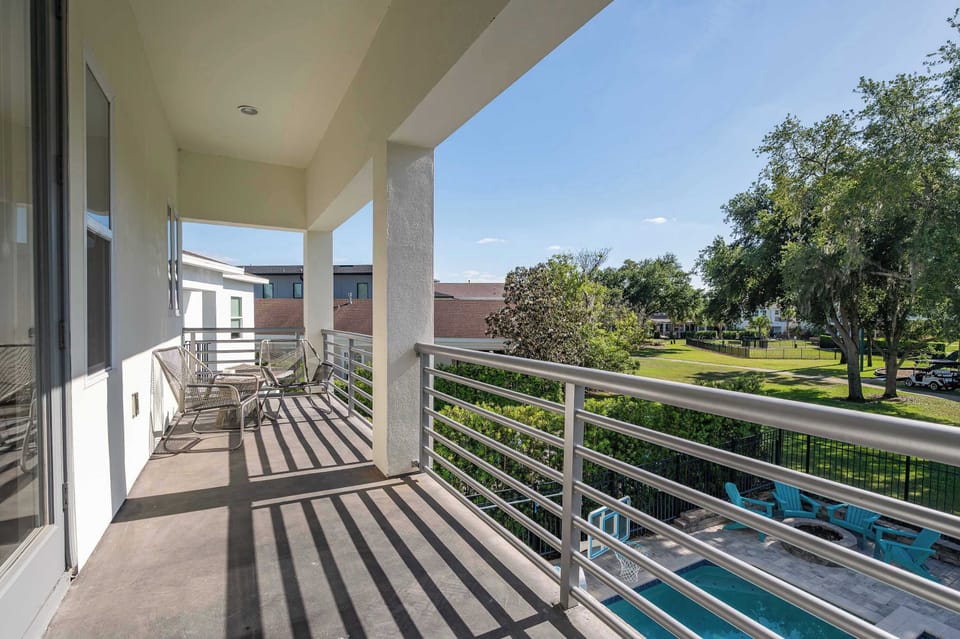 Long balcony walkway w/ peaceful views & space to enjoy fresh air outdoors