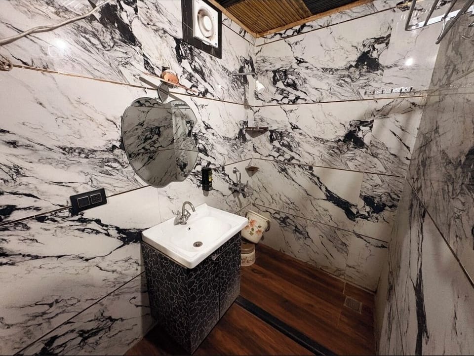 Shower, slippers, towels, soap