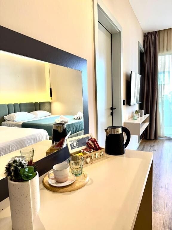 Triple Room, Balcony | Desk, laptop workspace, free WiFi
