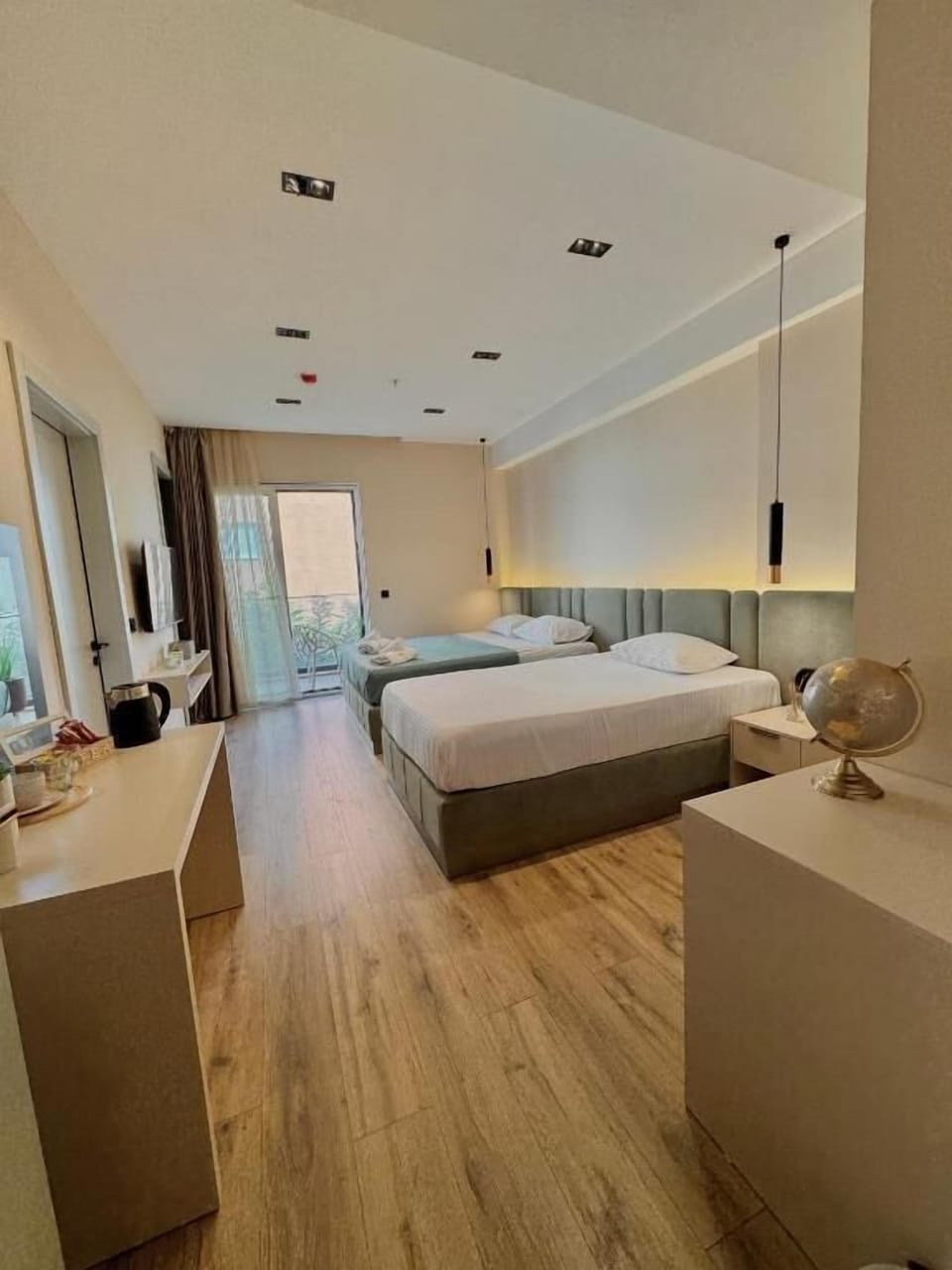 Triple Room, Balcony | Desk, laptop workspace, free WiFi