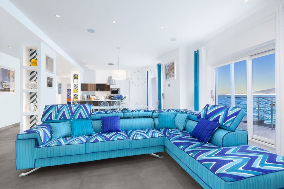 Blue, Furniture, Couch, Interior Design, Living Room, Textile, Floor, Flooring, Throw Pillow