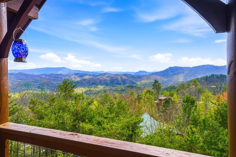Breathtaking mountain views stretch endlessly before you from your private covered deck, where morning coffee tastes even better.