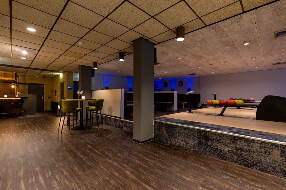 Gather for foosball and games in a relaxed lounge setting.