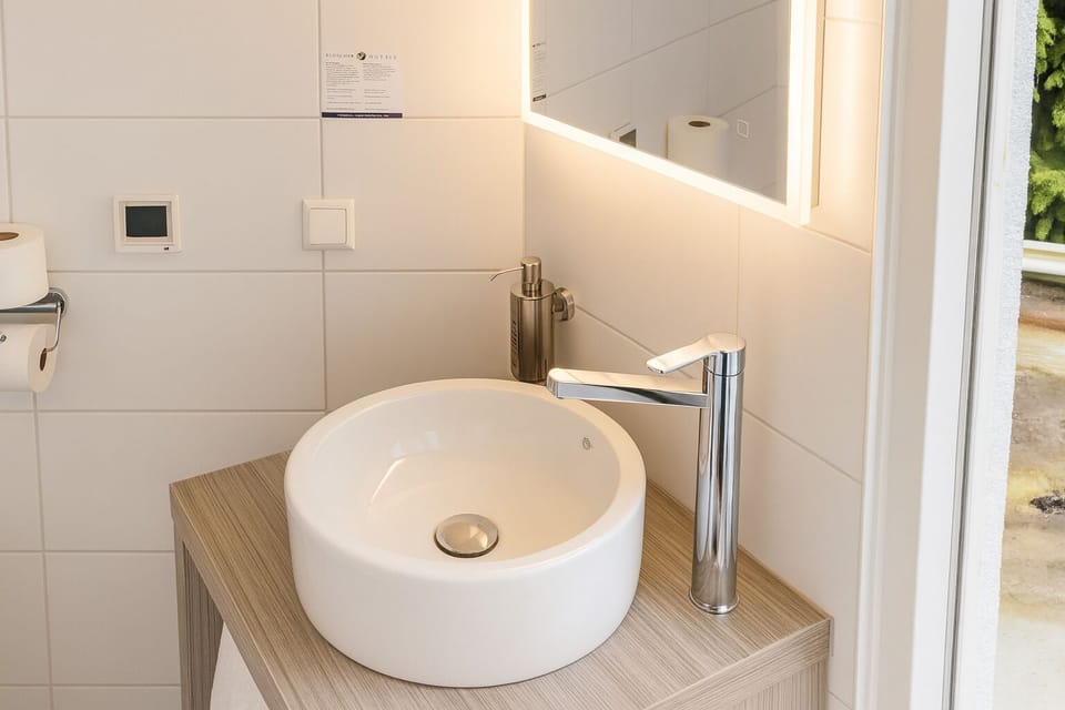 Start your morning with a bright, modern vanity setup.