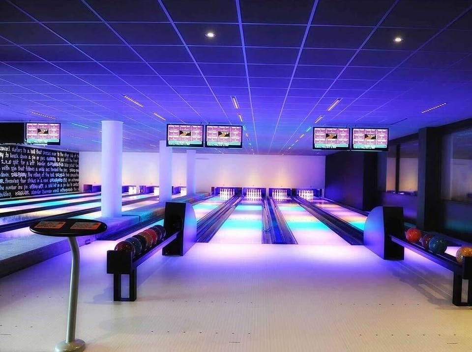 Gather friends for glowing lanes and upbeat bowling nights.